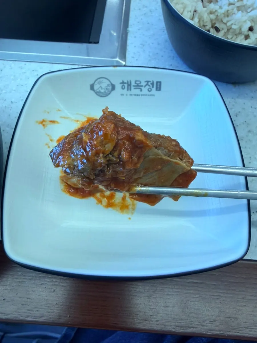 Pork ribs that pull easily from the bone and rice-cake add-ons