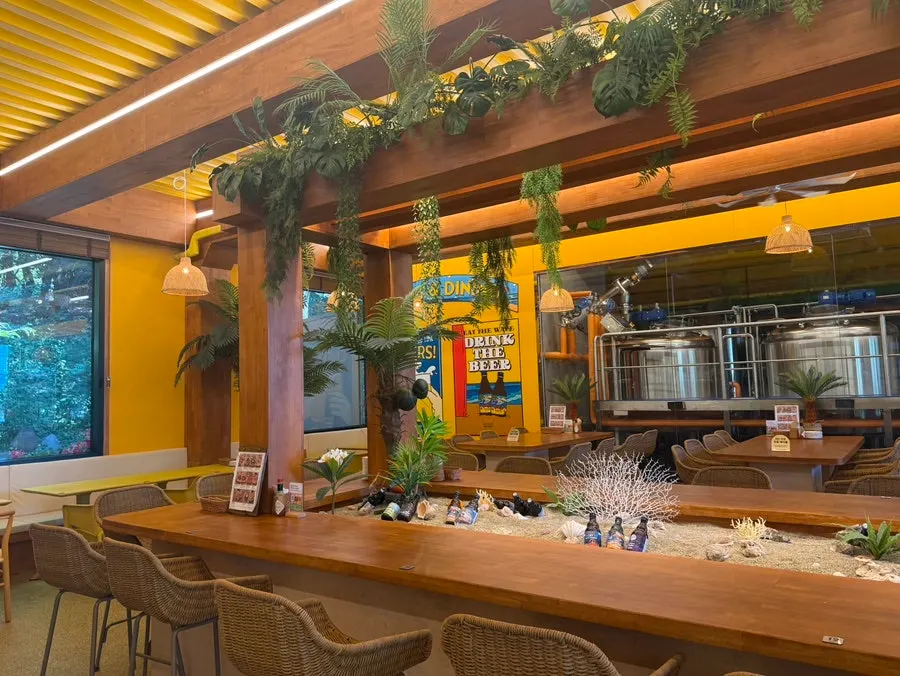 Wide tables and bar seating in the pub