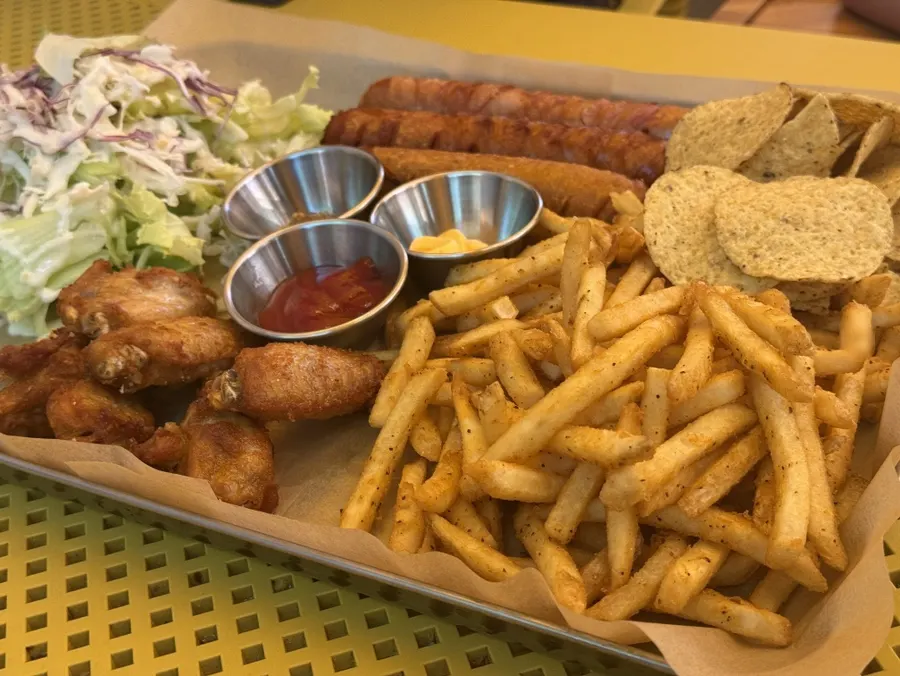 Springy sausage and fries on the platter