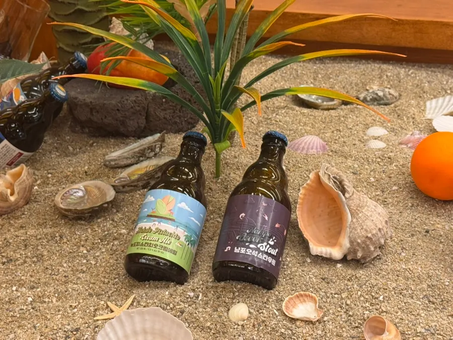 Craft beer served alongside the pizza