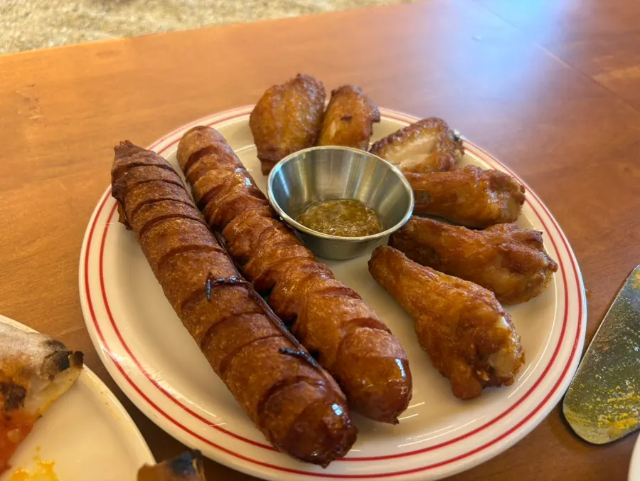 Solo platter with sausage and buffalo wings