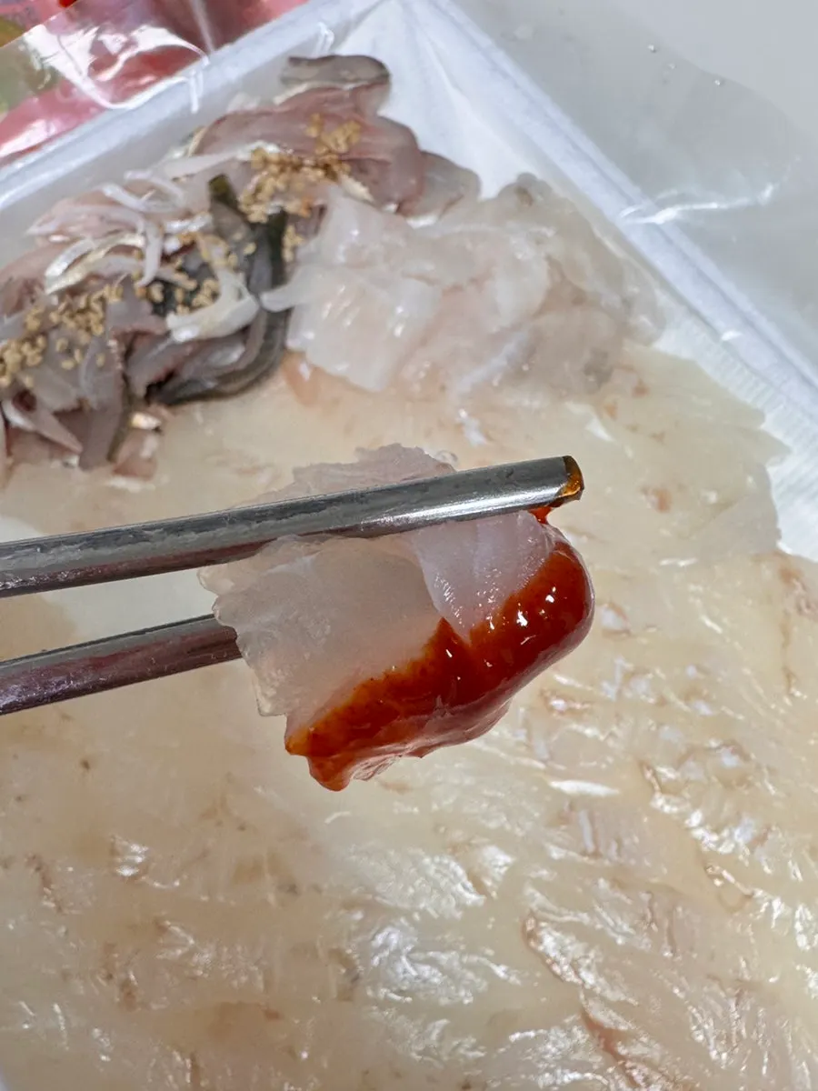 Flounder being prepared on the cutting board at Nokdo Susan
