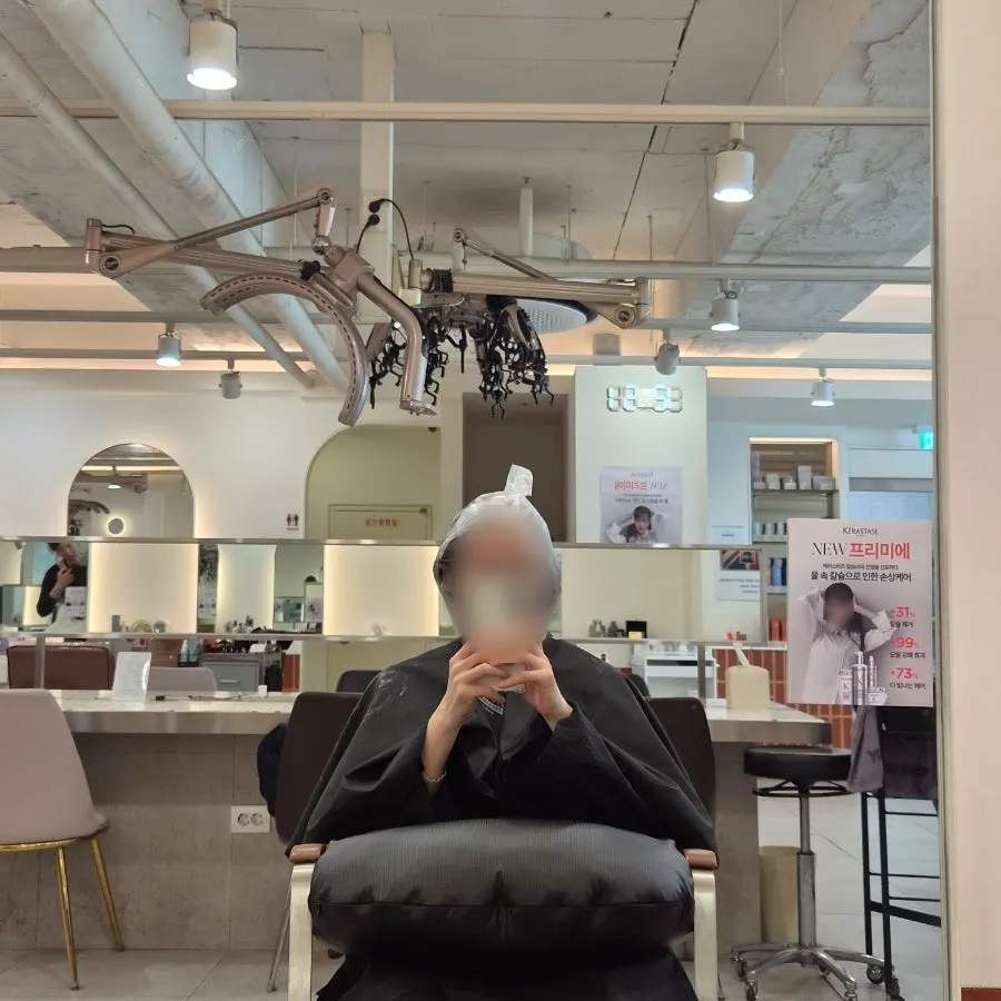 View of the salon's service seating while waiting for color