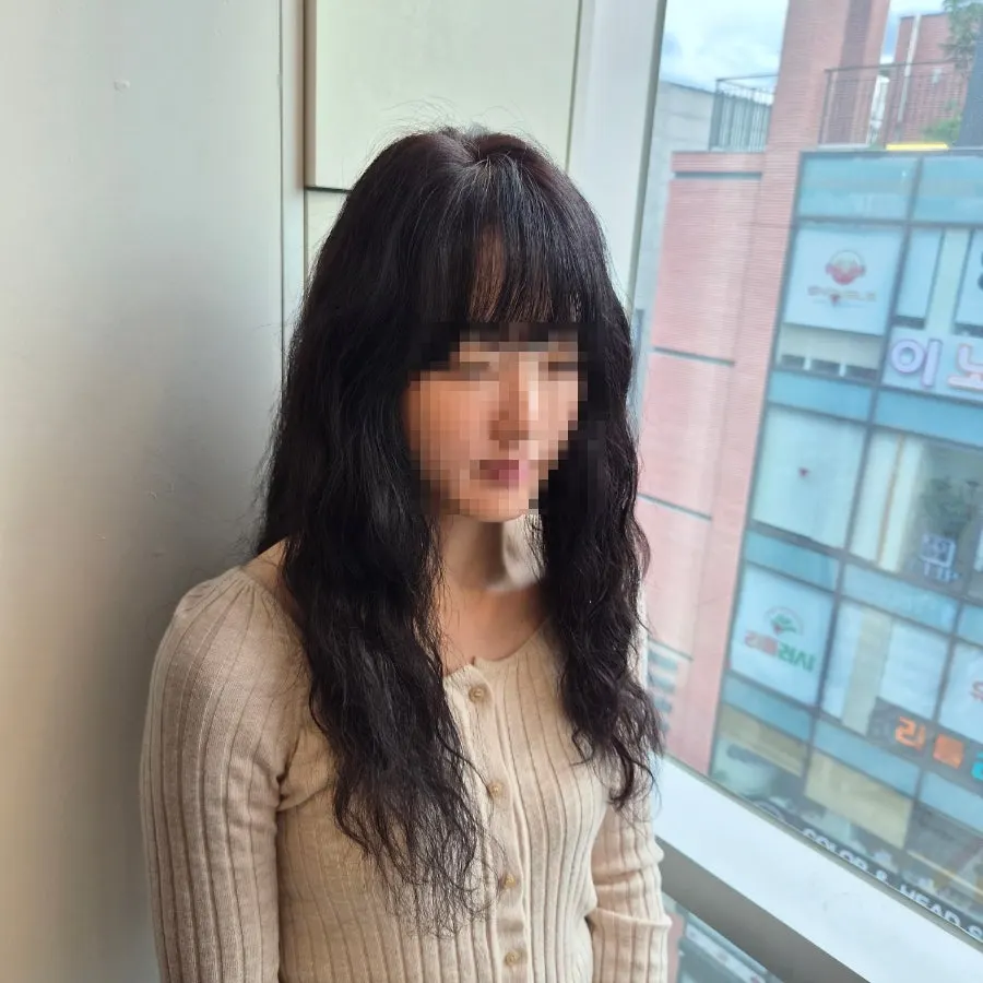Close-up of hair texture smoothed by the clinic treatment
