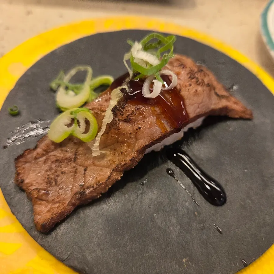 Steak sushi with sauce