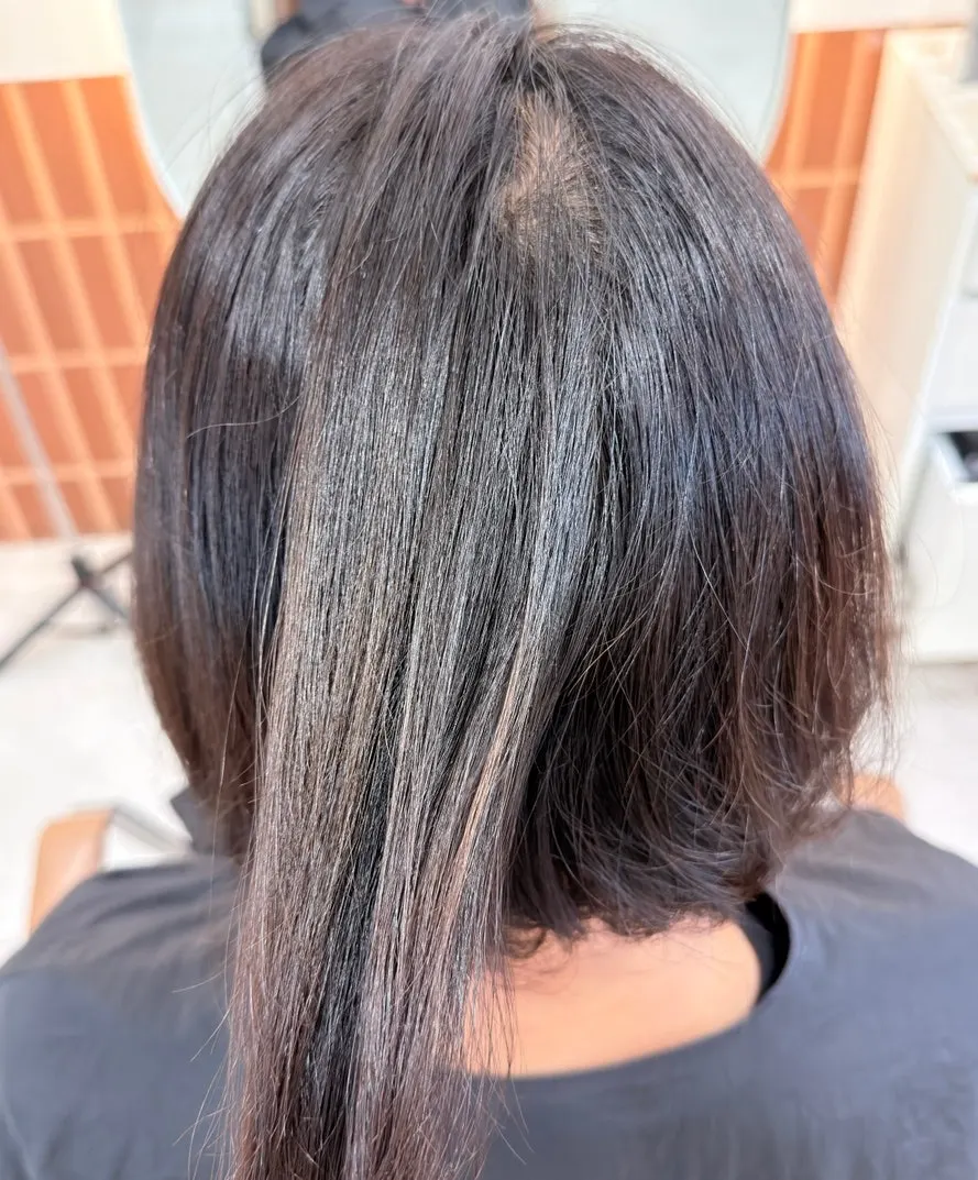 Ambiguous hair color before dyeing with leftover red tone