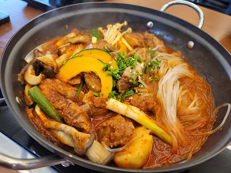 Pot of spicy galbijjim served nearly fully cooked