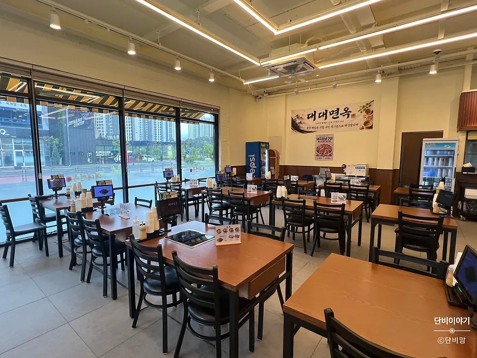 Interior of Daedae Myeonok with plenty of tables