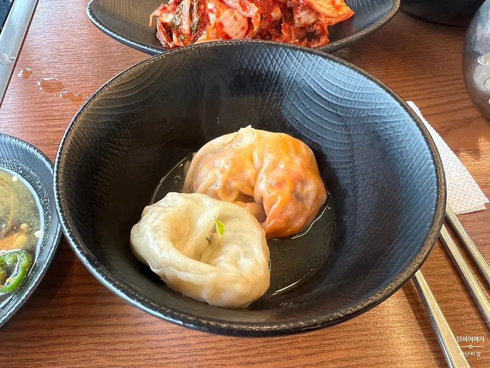 Aromsatae mandu jeongol pot with dumplings set aside