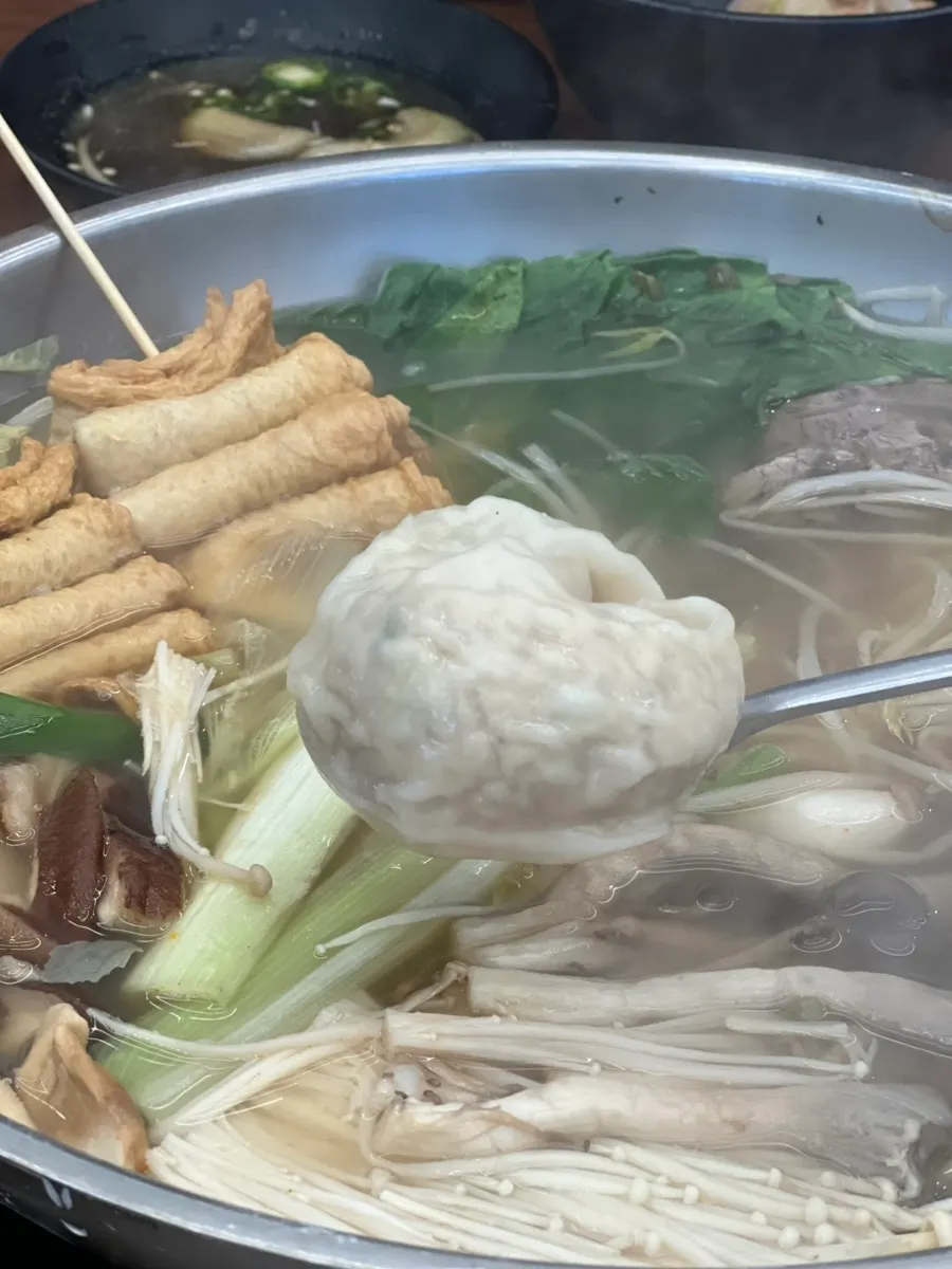 Large hand-made dumplings pulled from the broth