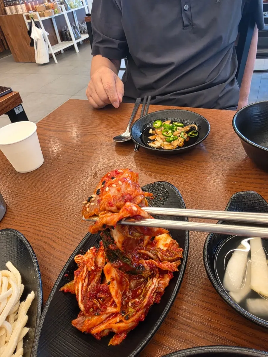Mandu jeongol starting to boil in the pollack broth