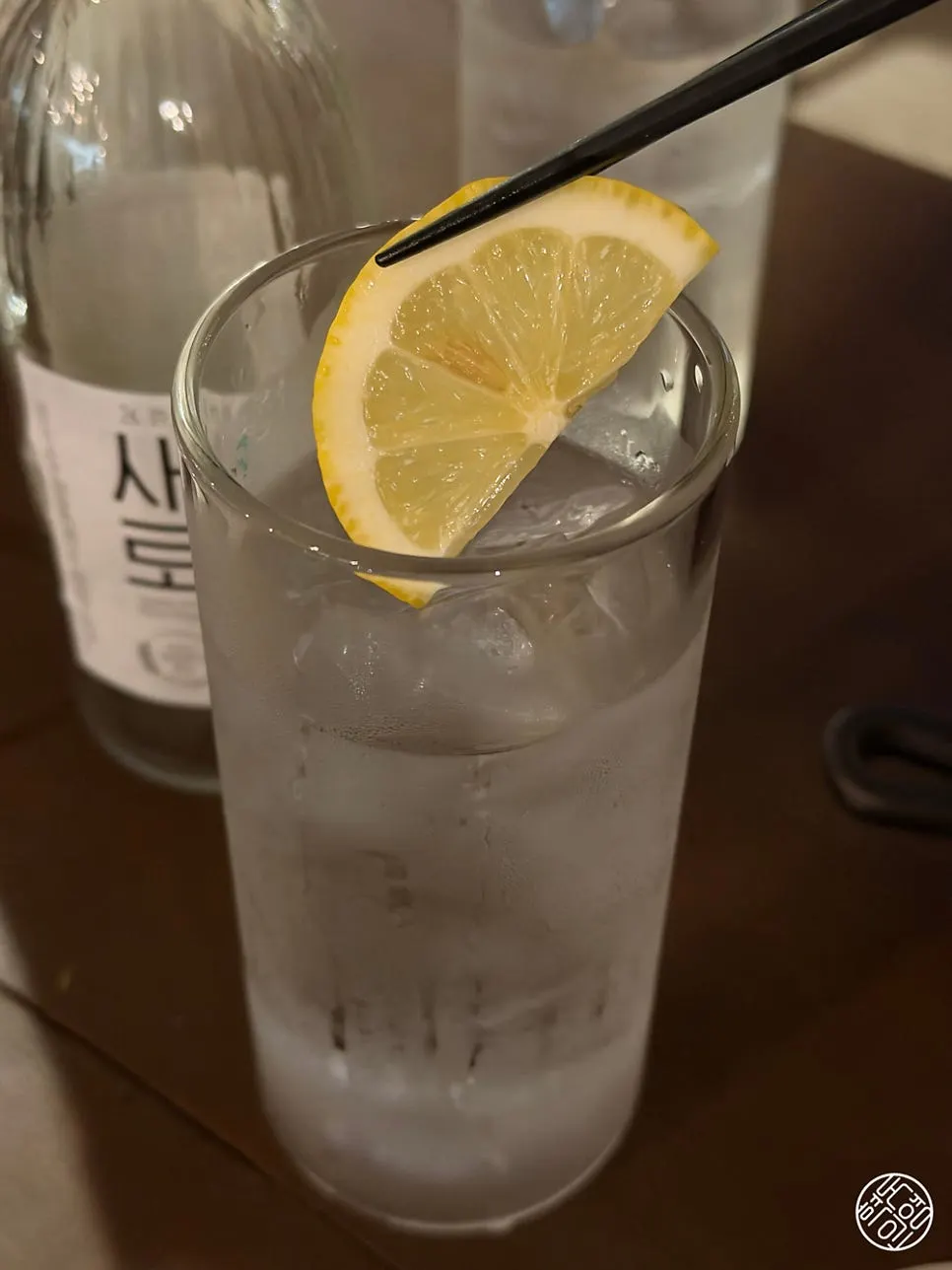 Soju and lemon slices set on the table
