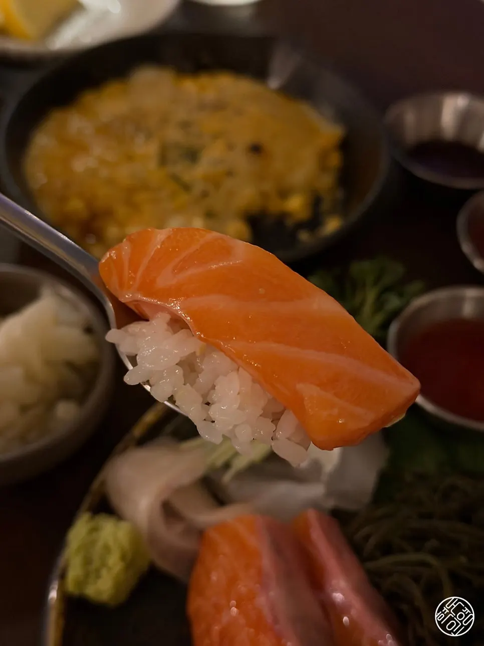 A homemade piece of salmon sushi