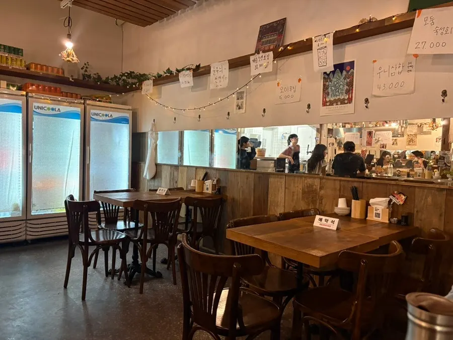 Self-serve bar with chojang, soy sauce, seaweed, and tableware
