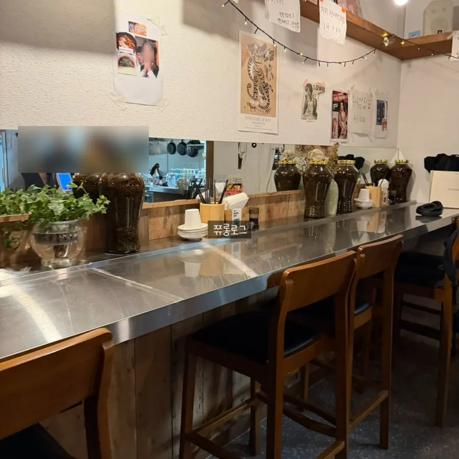 Daegang's outdoor tables filled with customers