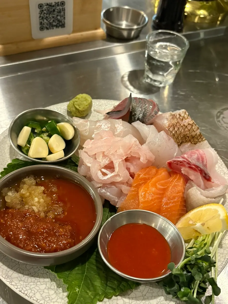 A plate of Daegang's signature aged sashimi, plated