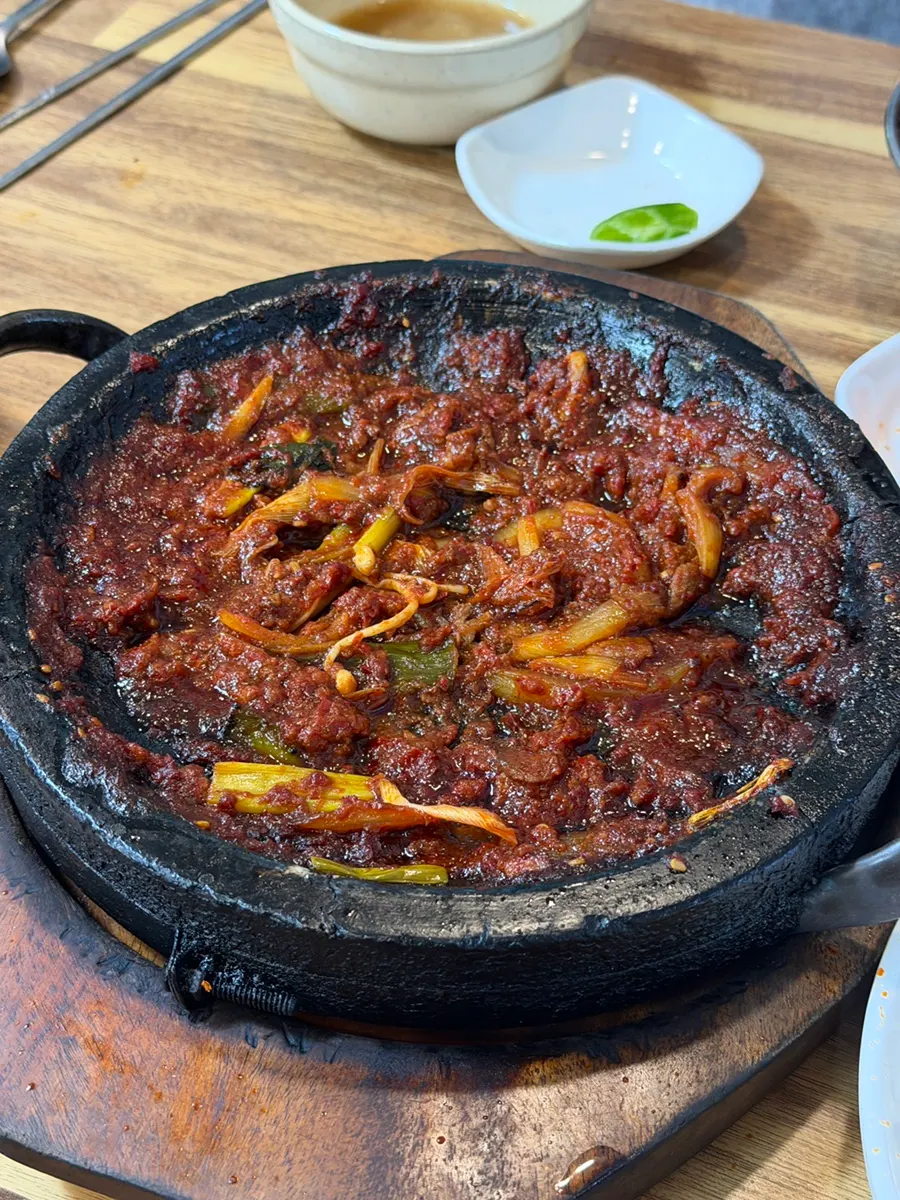 Bibimbap topped with meat