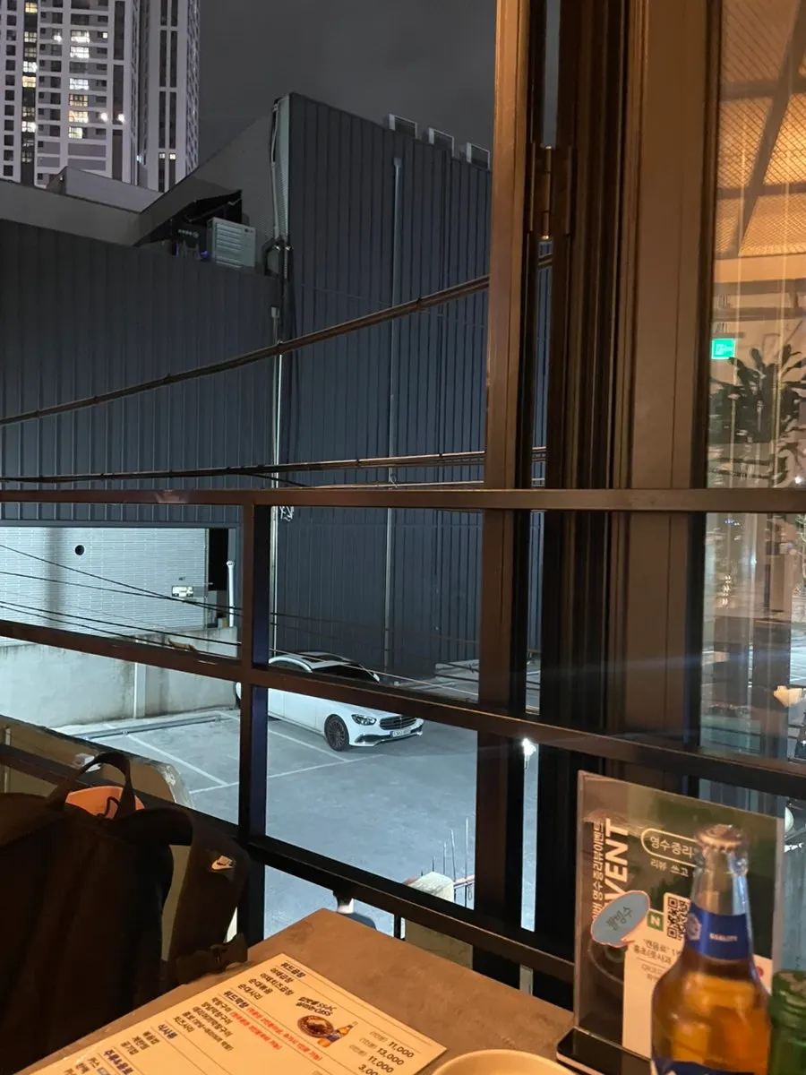 Window-side atmosphere at With Gopchang with an outdoor-tent feel