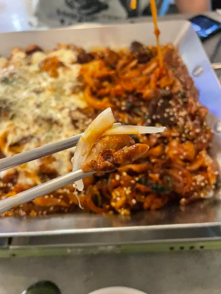 Vegetable cheese gopchang topped with melted cheese