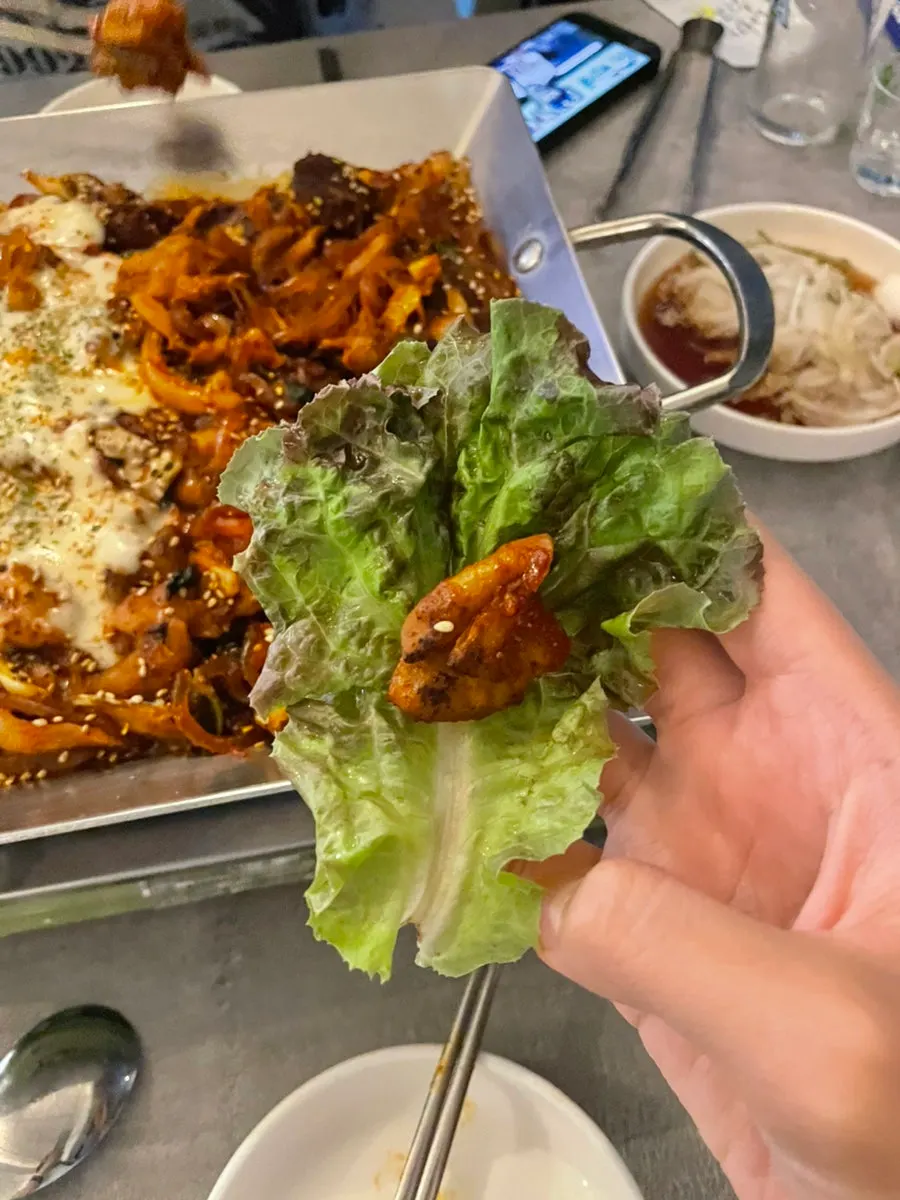 Vegetable gopchang wrapped in lettuce at With Gopchang
