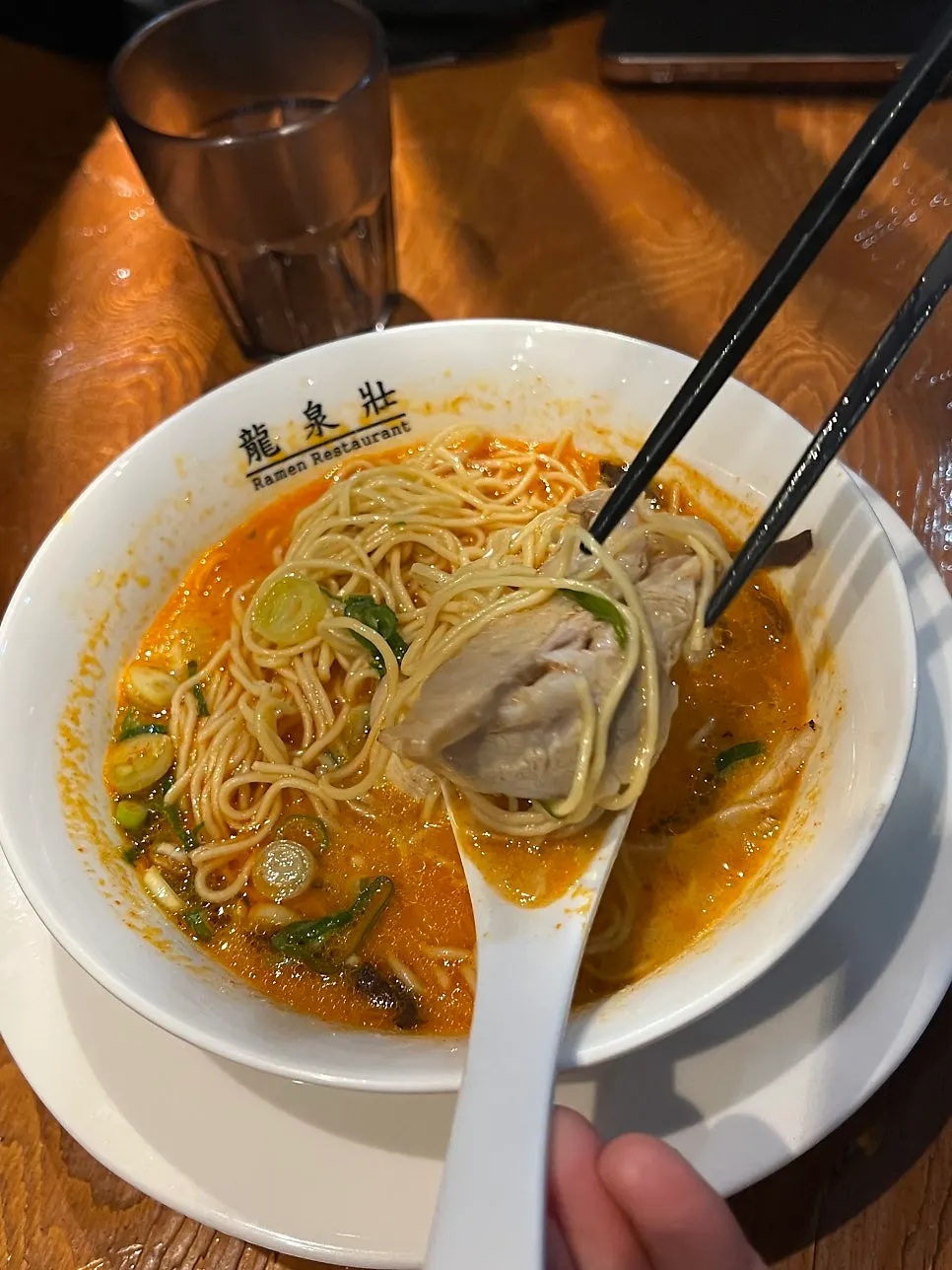 Ryusenso Kara ramen broth being eaten