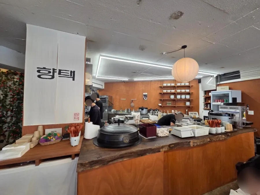 Interior of Hyangtaek Daebong Branch with an open kitchen