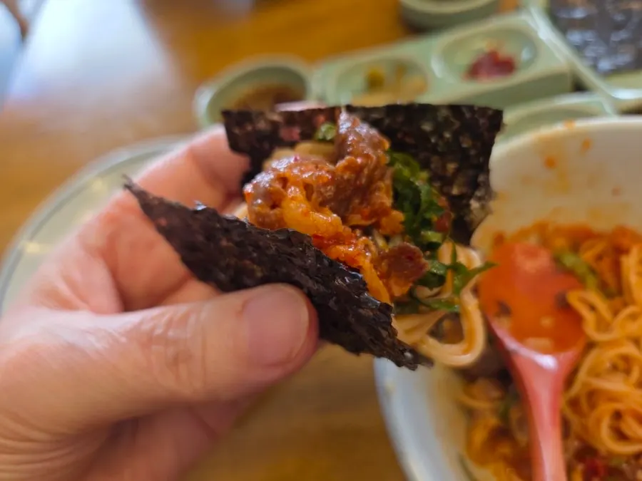Korean meal served with gopchang gim