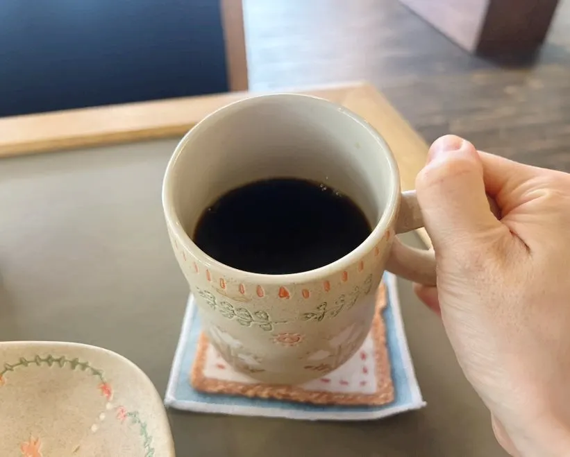 Coffee cup and coaster