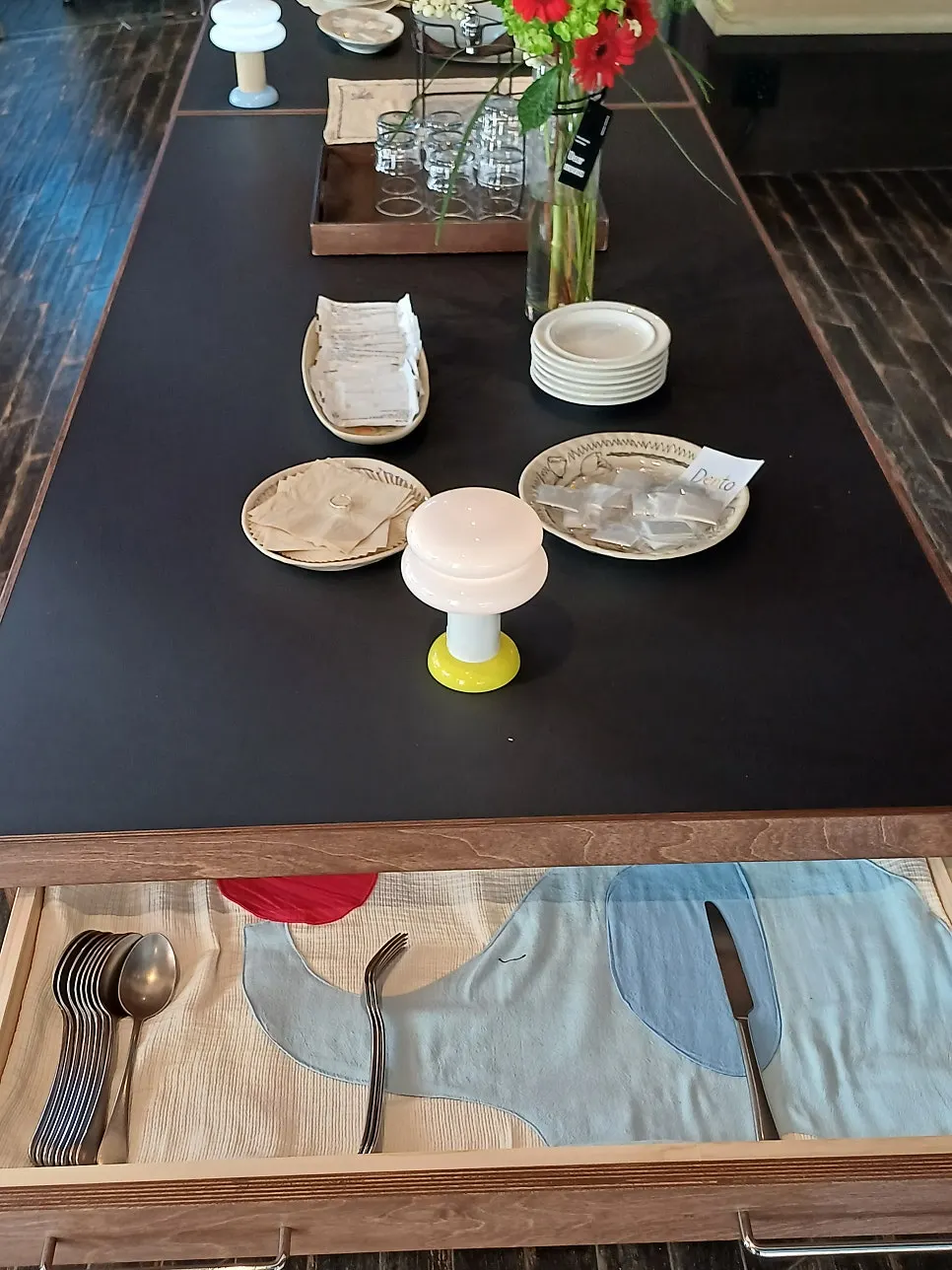 Dento's interior decor with flower arrangements