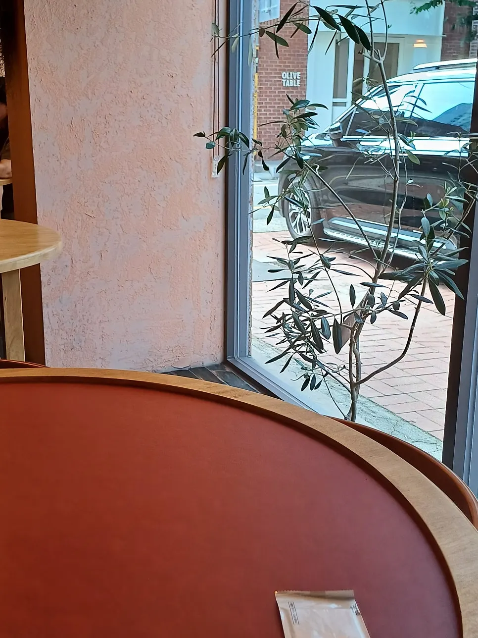 Square table and chair arrangement at Dento
