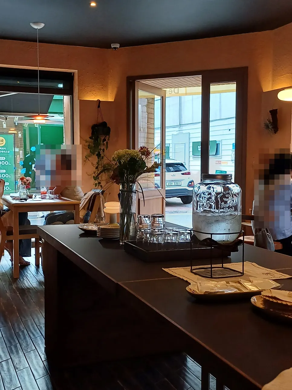 Window-side seating atmosphere at Dento