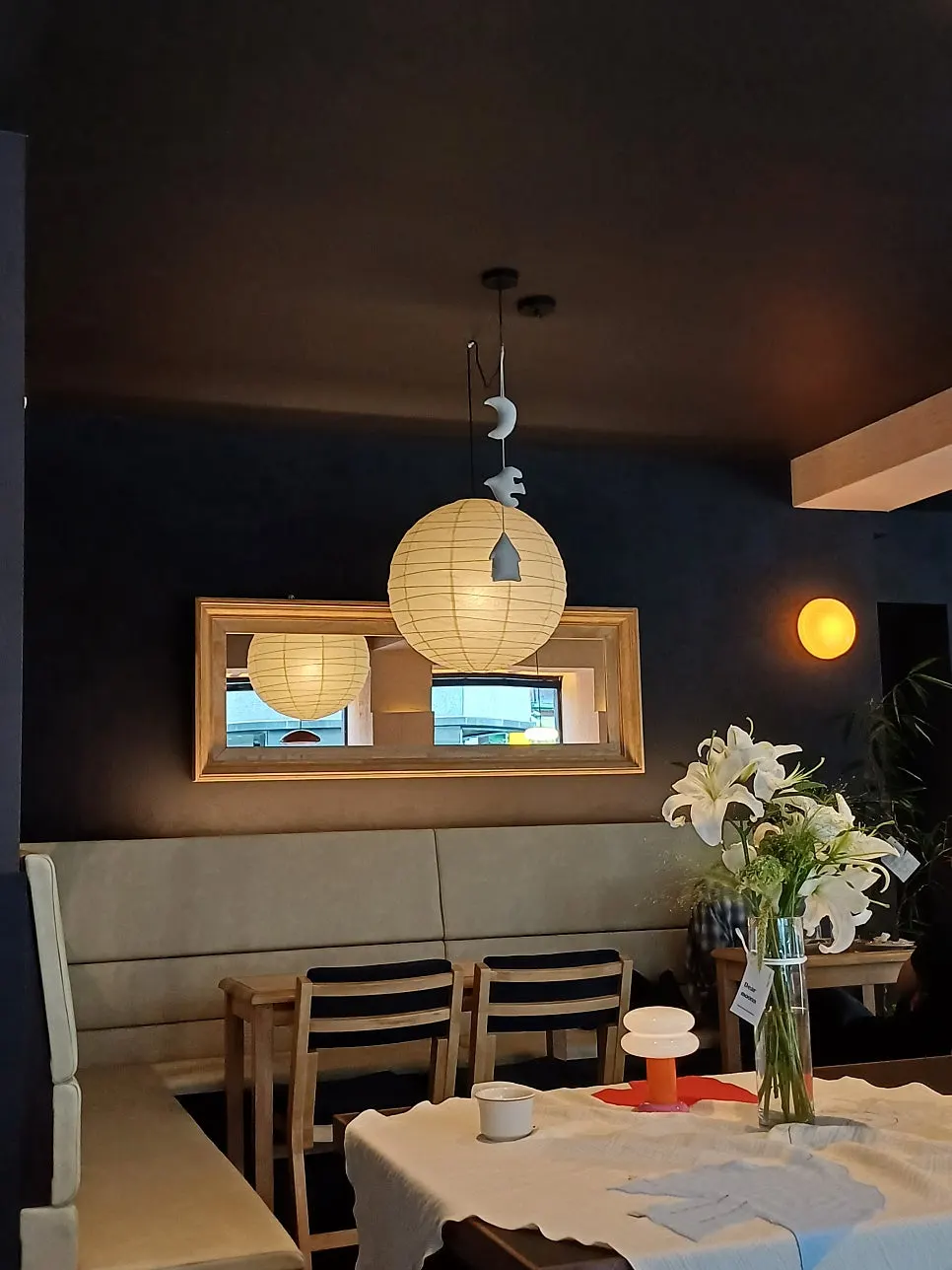 Relaxed seating and table setting at Dento