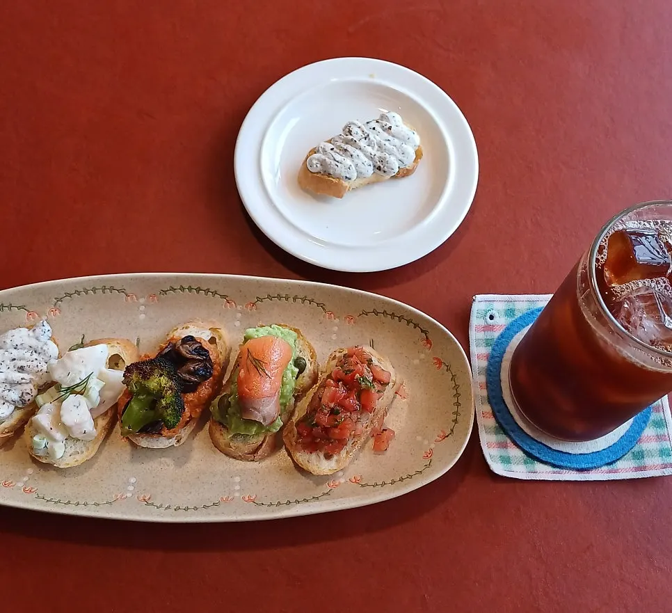 Five bite-size open sandwiches with iced drip coffee