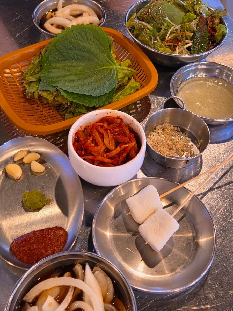 Basic side dishes laid out at the self-serve corner