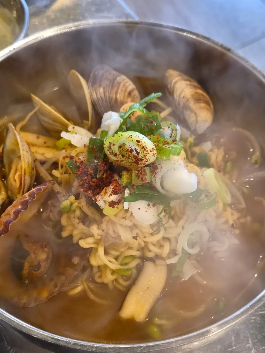 Seafood ramyeon loaded with clams and scallops