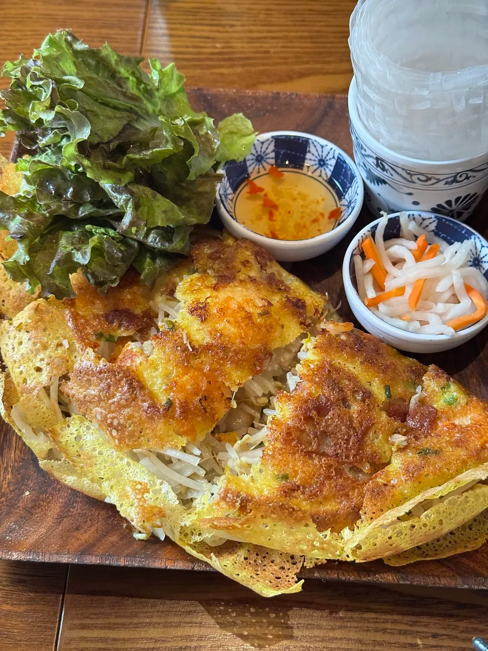 Bánh xèo dipped in sauce