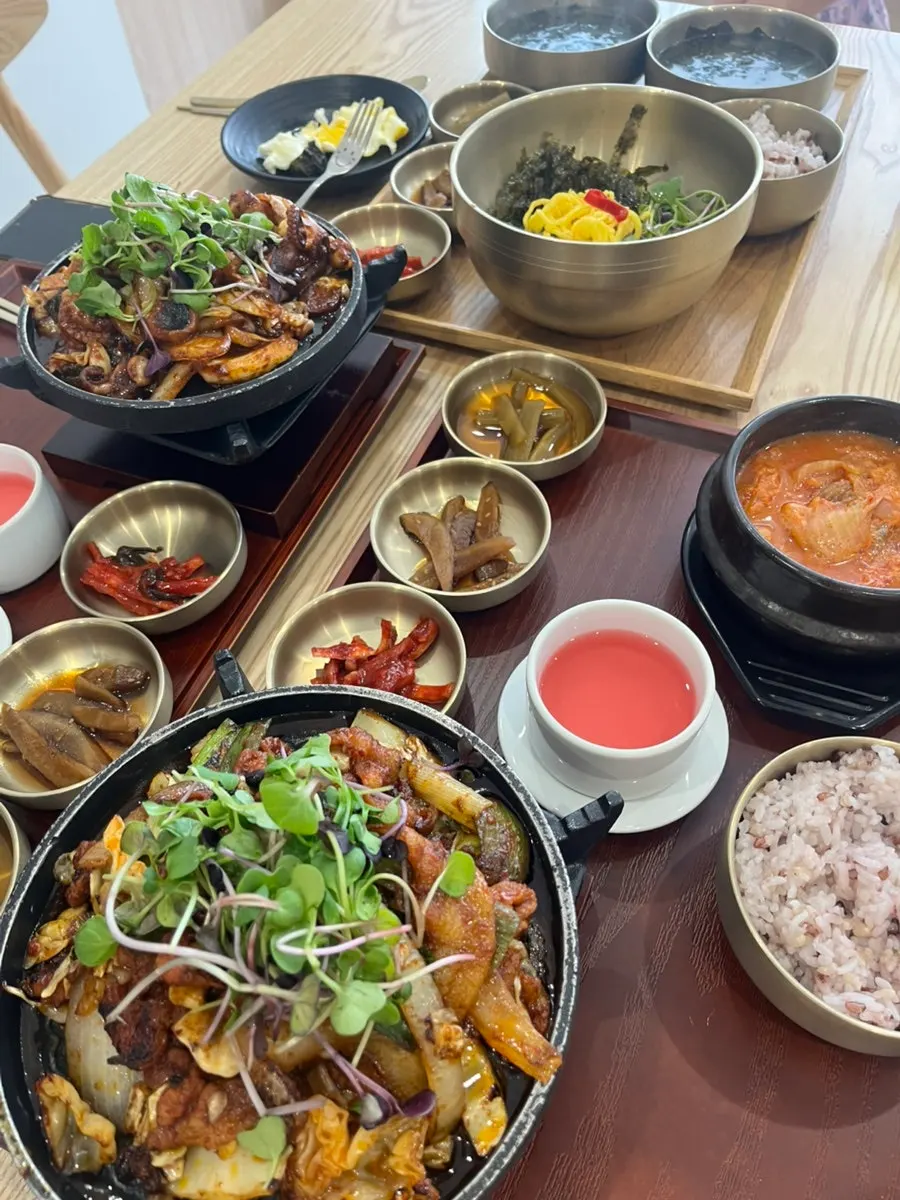 Vertical photo of the meal spread at Cafe Dongi Daemyeong Station Branch