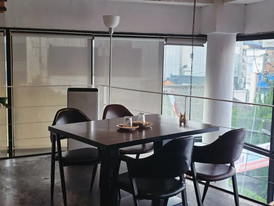Second-floor seats at Dana for easy conversation