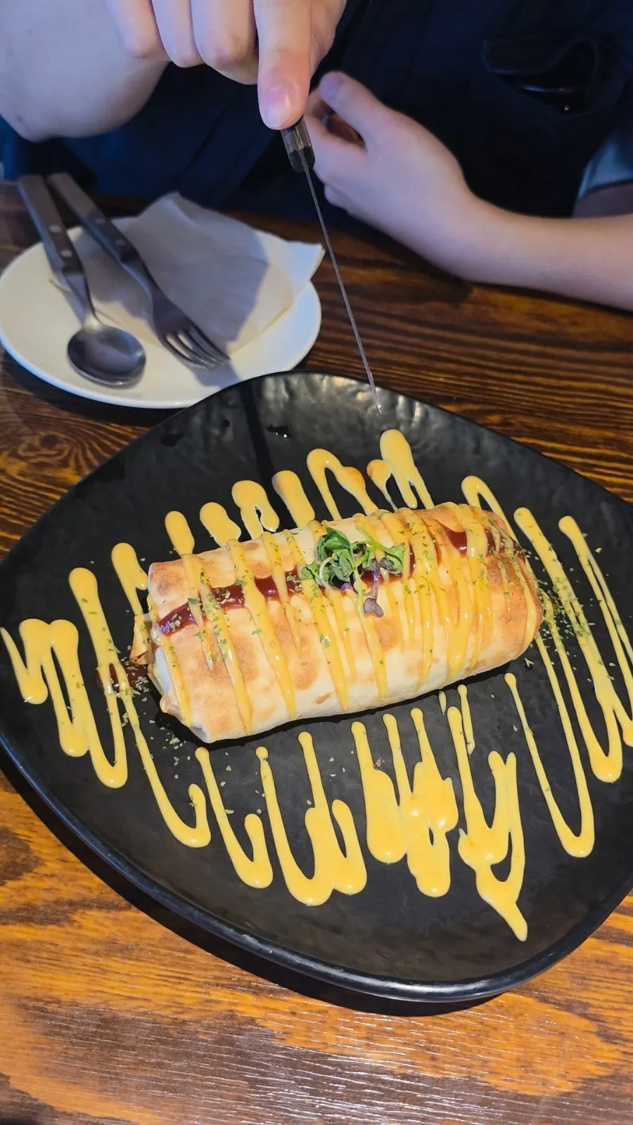 Neatly rolled round baked risotto