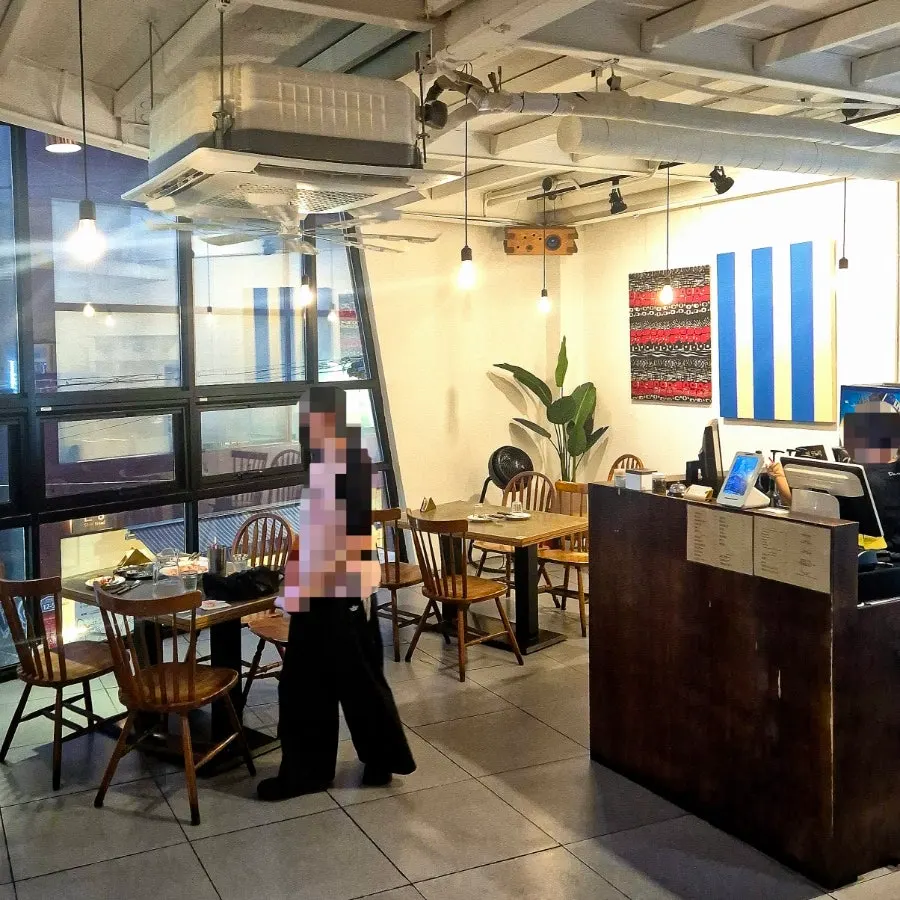Cozy, refined split-level restaurant interior