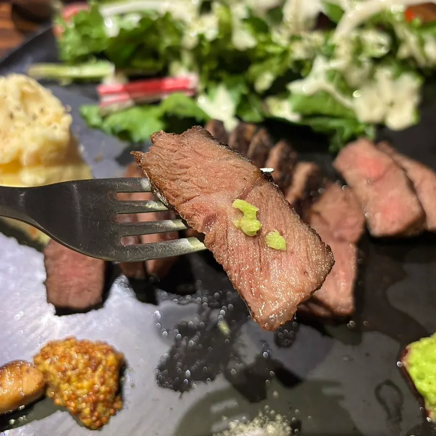 Flat iron steak cut into easy-to-eat pieces