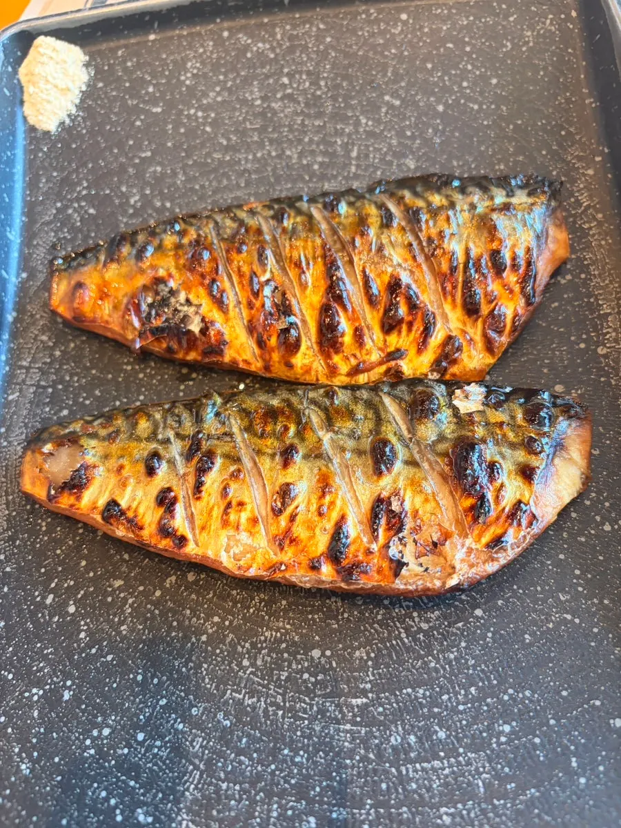 Wood-fired grilled mackerel at Geumdeungeo Deulanguil Main Branch