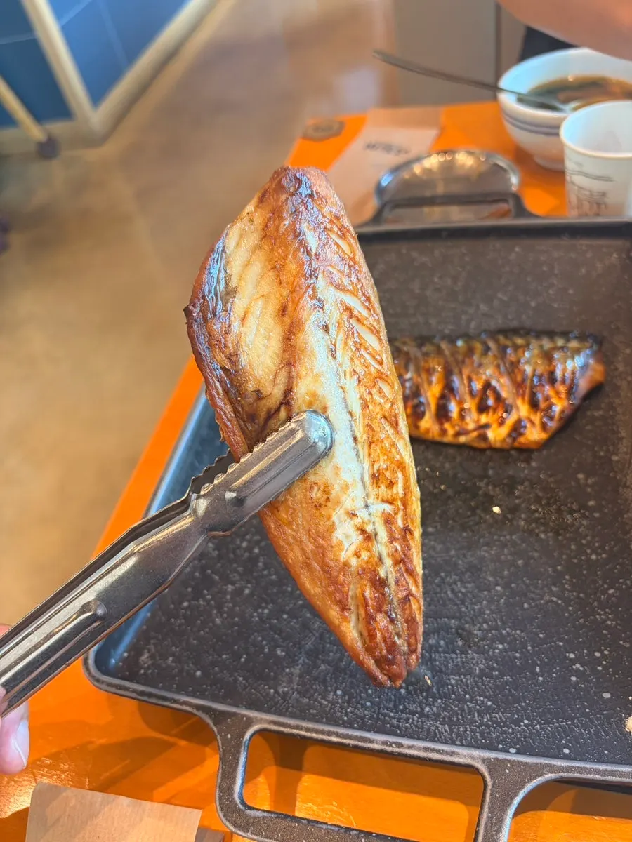 Wood-fired mackerel with golden-browned skin