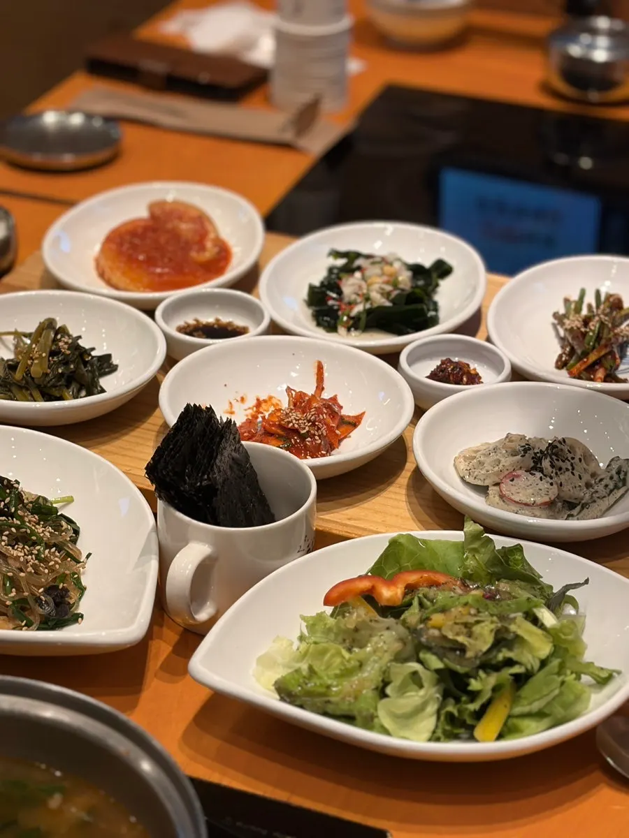 Several plates of side dishes