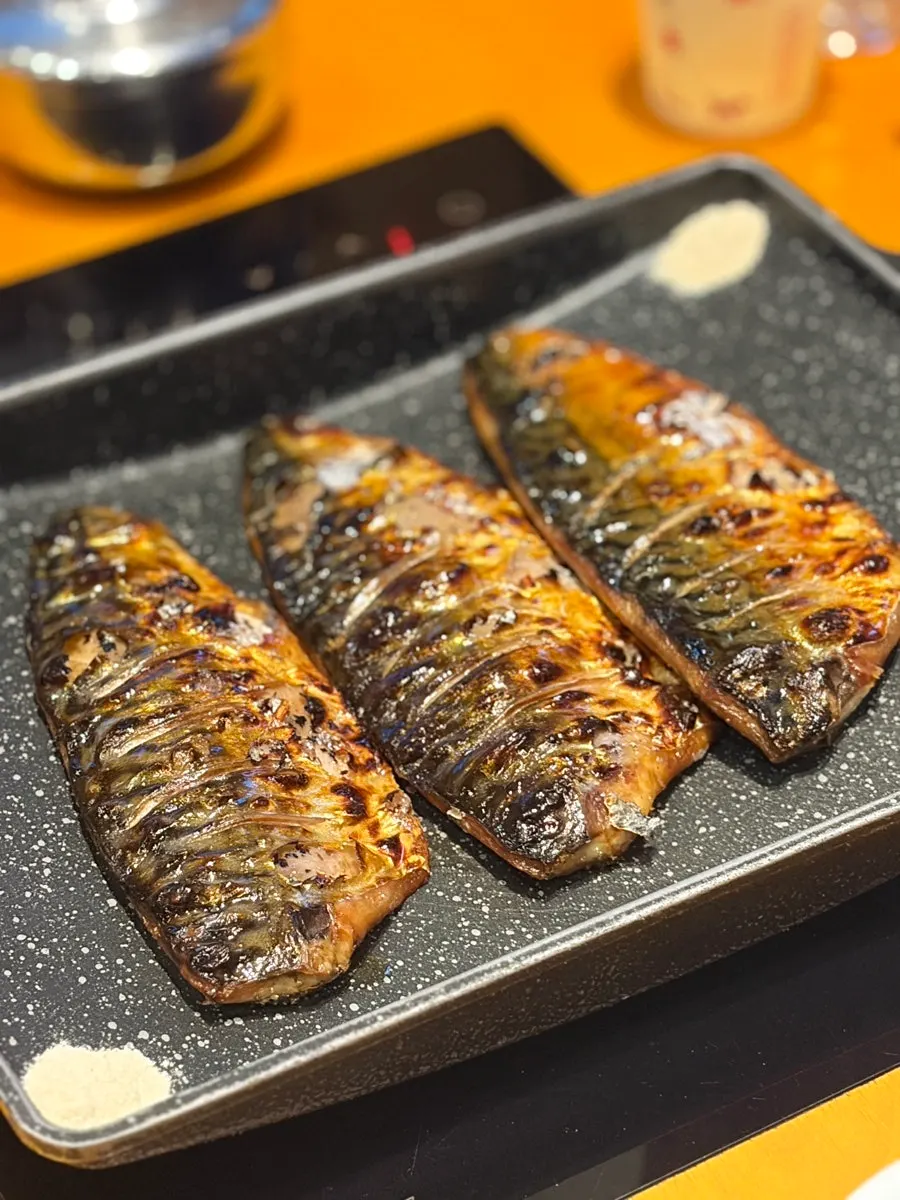 A whole nuruk-salt cured wood-fired mackerel