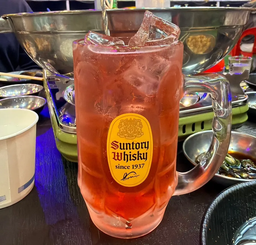 Lemon peach highball and strawberry highball, two glasses