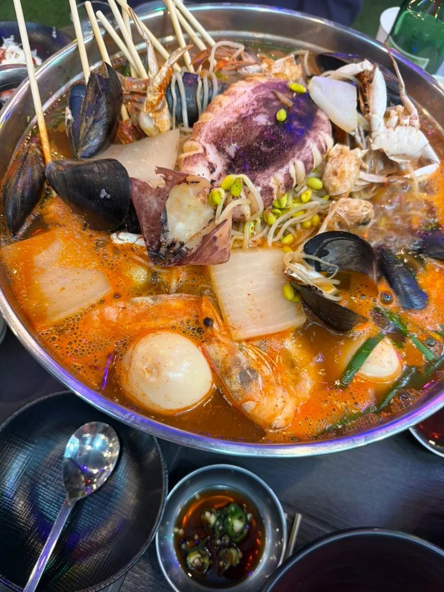 Premium seafood fish cake stew piled with seafood