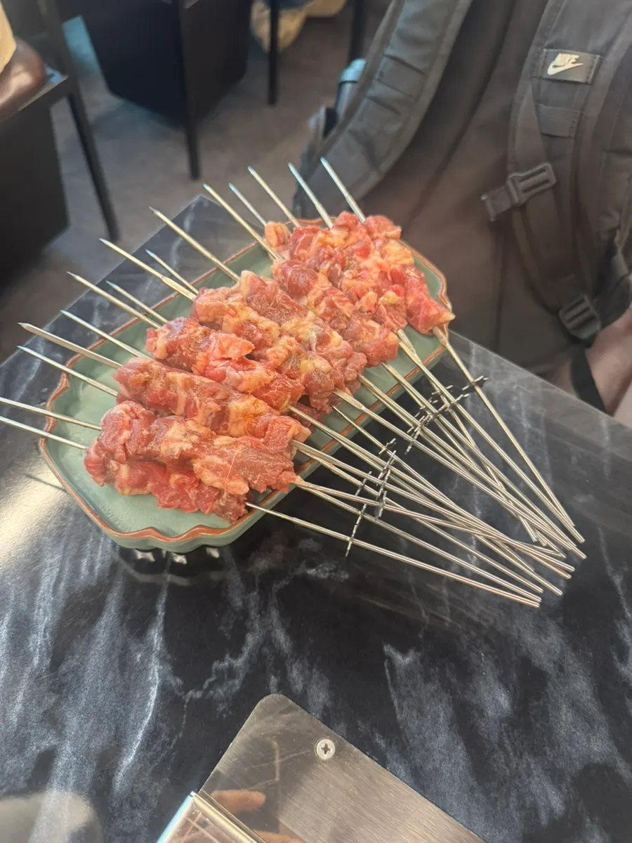 Two portions of lamb skewers, 16 skewers total