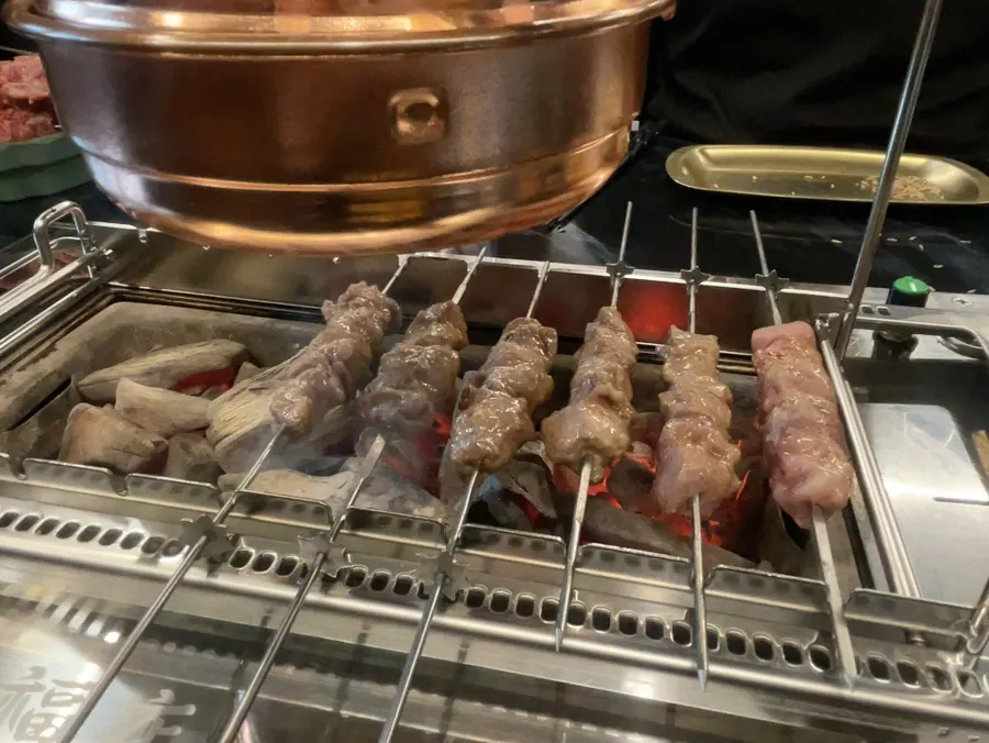 Golden-brown cooked lamb skewers