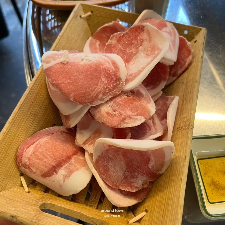 A full spread of ordered frozen pork belly and pork cheek meat